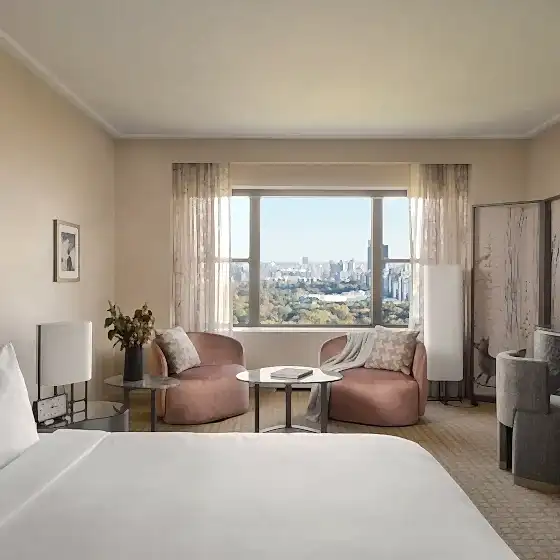 A king suite at Park Lane New York overlooking Central Park.