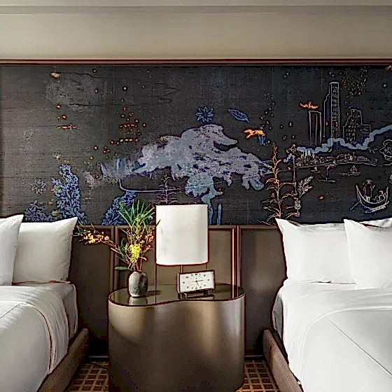 Park lane two queen, 2 beds side by side with a night stand in the middle