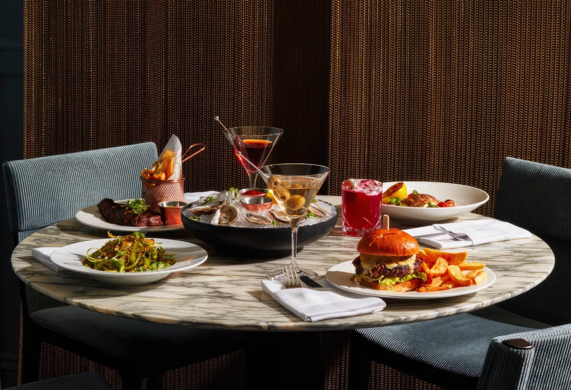 A table of assorted dishes and drinks.